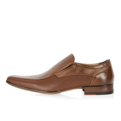 Brown perforated slip on shoes